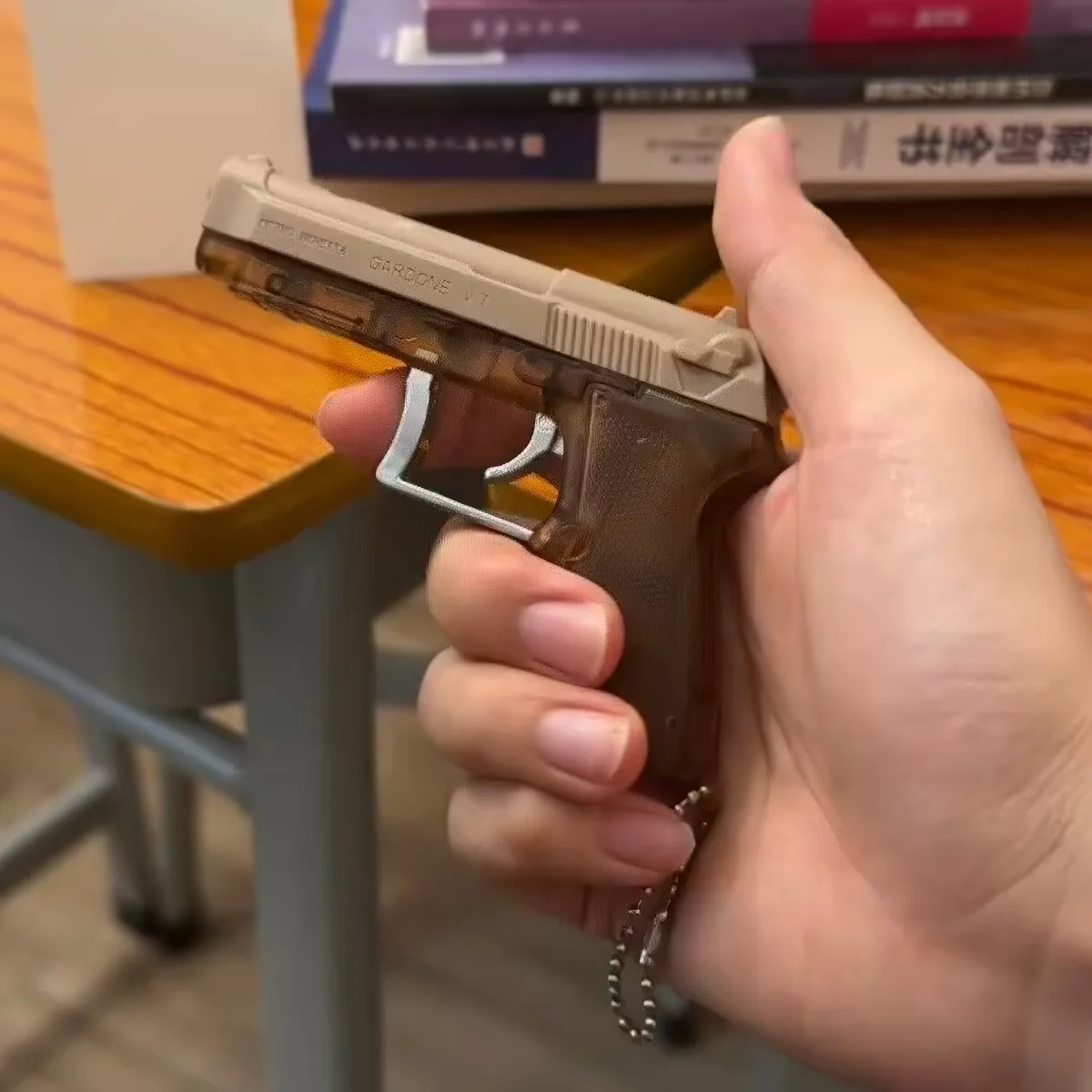 Porte-clés pistolet jouet surp - Shock Pen Prank Toy avis et prix